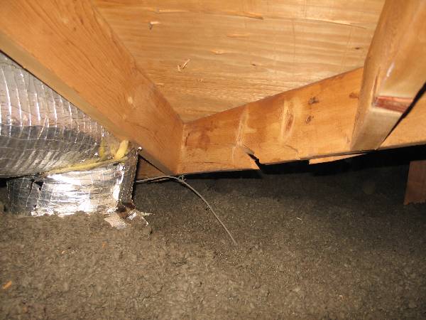 Wind load cracks valley rafter of Florida house